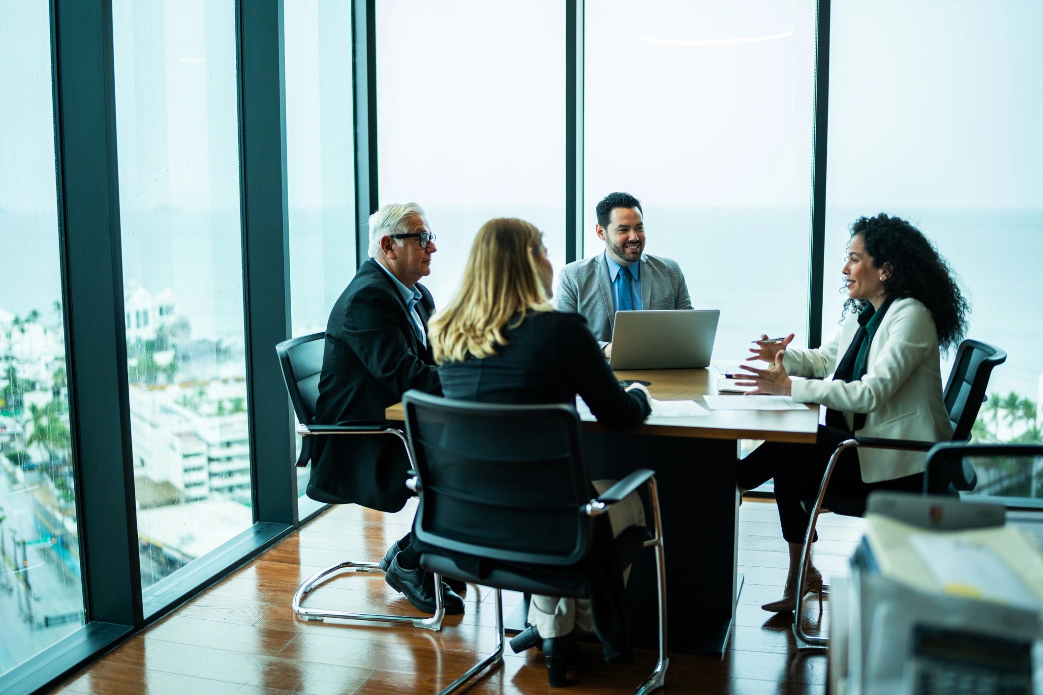 Commercial property investors meeting in an office