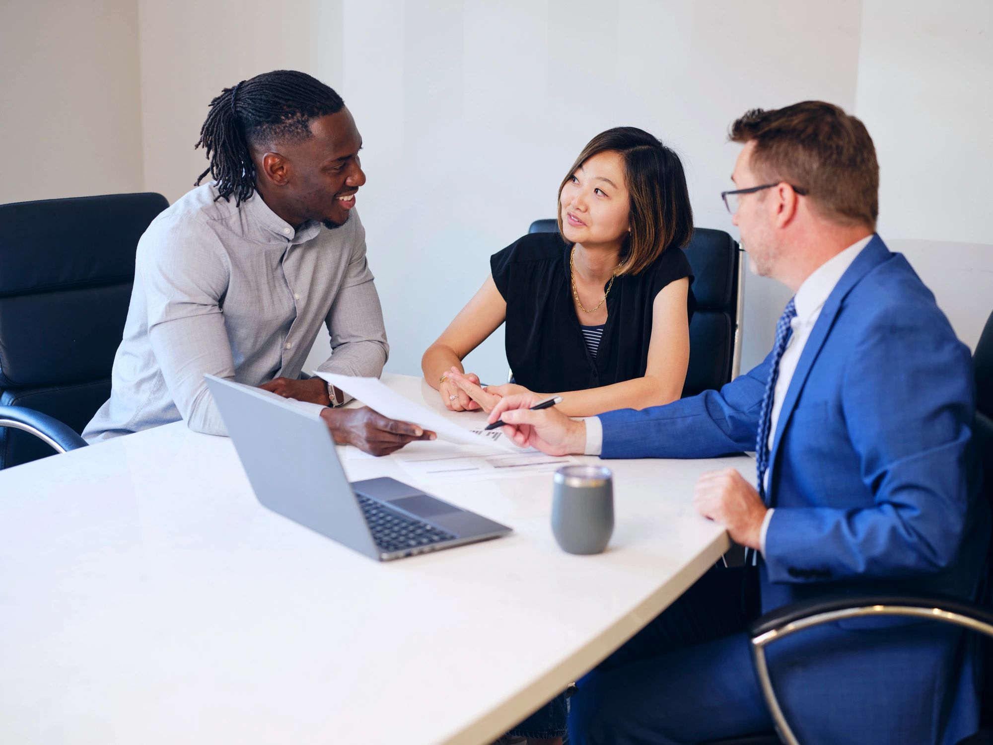 Clients meeting with a financial advisor