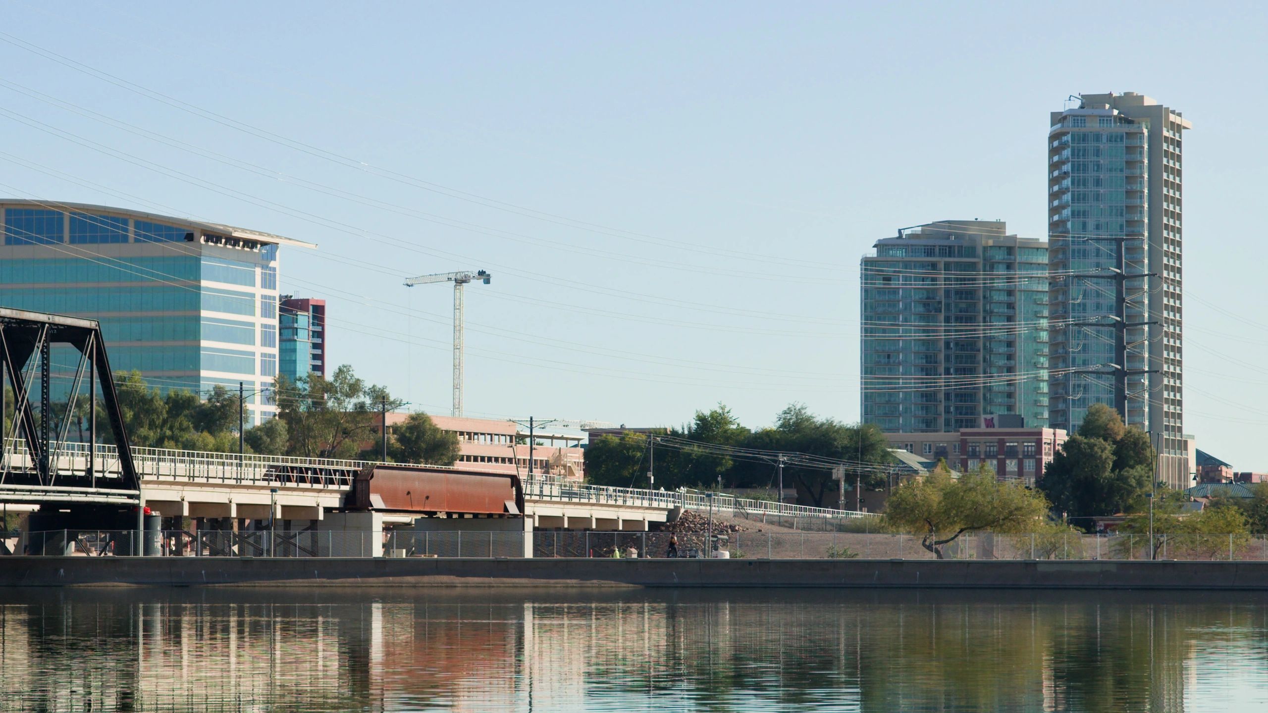 Tempe Town Lake and downtown Arizona skyline representing East Valley real estate growth